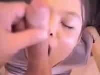 Japanese whore with a shaved pussy gives a hot blowjob